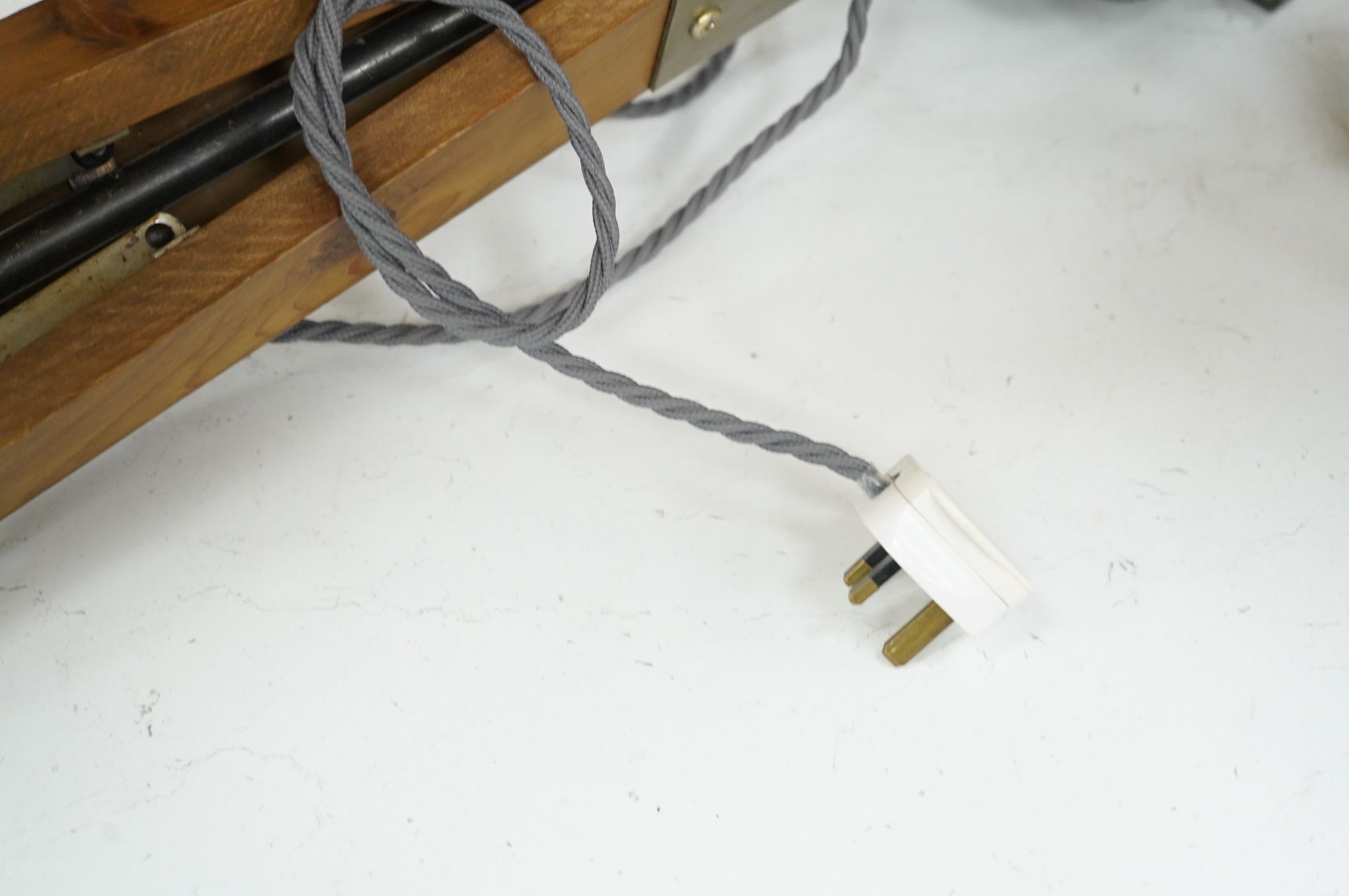 A vintage strand electric theatre lamp on tripod base, 89cm high